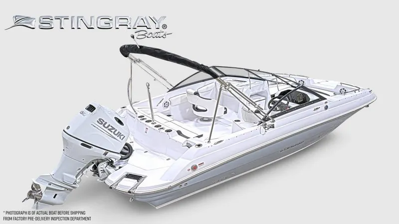 Slide: The Image of 2025 Stingray 201 DC boat with Suzuki outboard motor, sleek design, and modern features. - 5