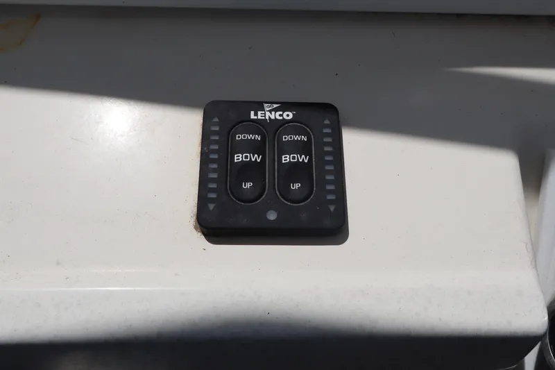Slide: The Image of Lenco trim tab control on 2005 Sea Boss 235 Walkaround boat. - 16