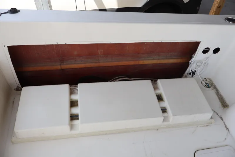 Slide: The Image of 2005 Sea Boss 235 Walkaround boat interior storage compartment. - 5