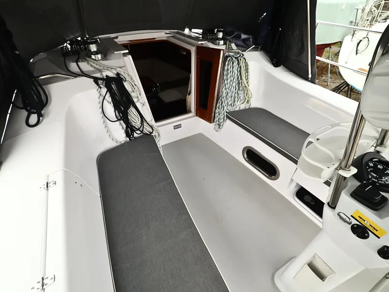 Slide: The Image of Cockpit of 2021 Catalina C355 sailboat with seating and nautical equipment. - 16