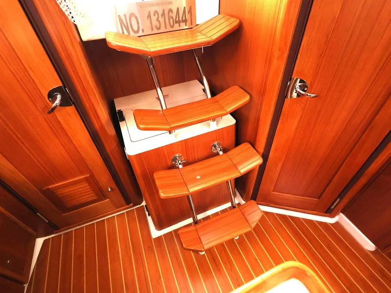 Slide: The Image of Interior of 2021 Catalina C355 yacht with wooden steps and flooring. - 19