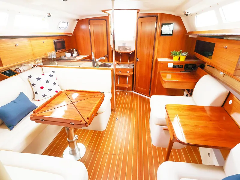 Slide: The Image of Luxurious interior of 2021 Catalina C355 yacht with wooden furnishings and modern amenities. - 23