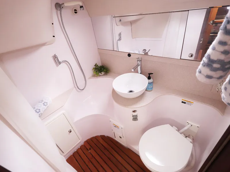 Slide: The Image of Modern bathroom in 2021 Catalina C355 yacht with shower, sink, and toilet. - 36