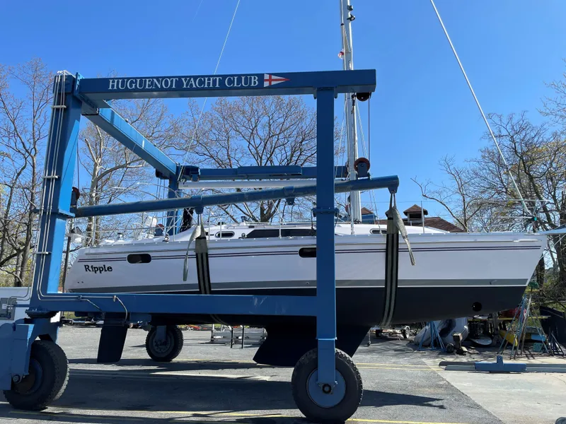 Slide: The Image of Catalina C355 sailboat at Huguenot Yacht Club, 2021 model, on a boat lift. - 4
