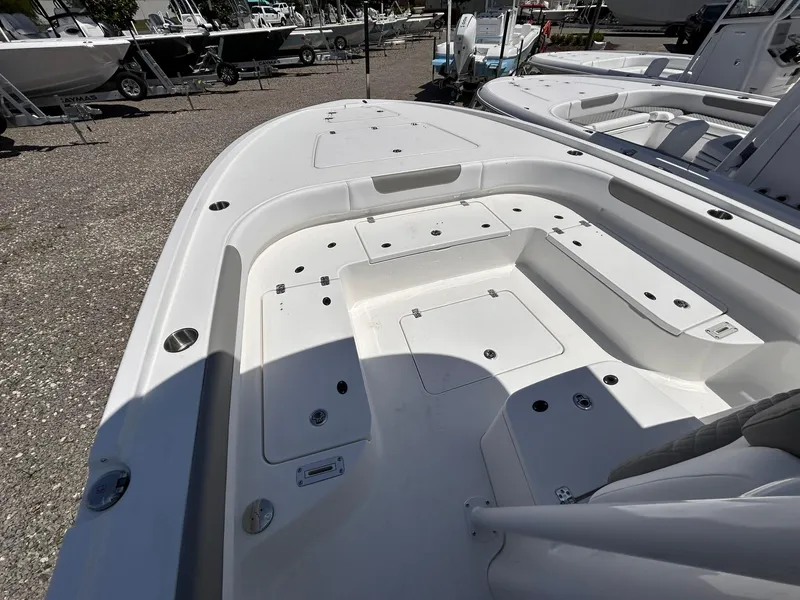 Slide: The Image of 2025 Caymas 28 HB boat deck, spacious layout, white finish, outdoor display. - 5