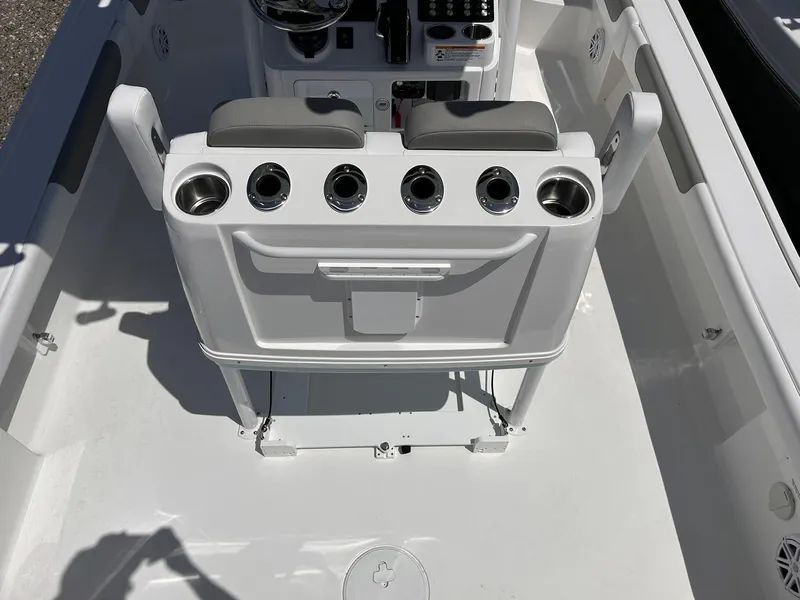 Slide: The Image of 2025 Caymas 28 HB boat interior with rod holders and seating. - 7