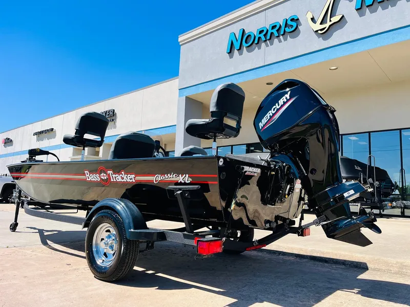 Slide: The Image of 2025 Tracker Bass Tracker Classic XL boat with Mercury engine at dealership. - 4