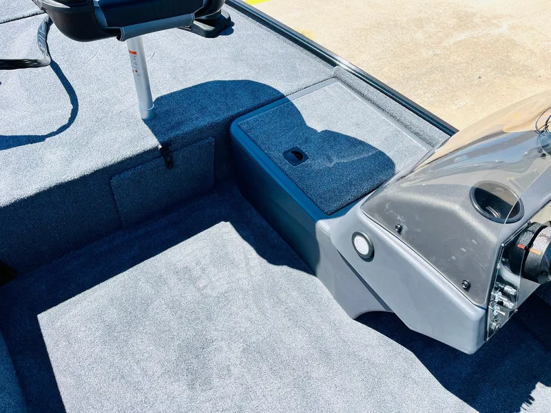 Slide: The Image of 2025 Tracker Bass Tracker Classic XL boat interior with seating and storage. - 9