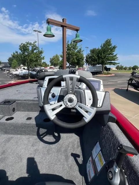 Slide: The Image of 2025 Tracker Pro Team 195 Tournament Edition boat steering wheel, outdoor display. - 6