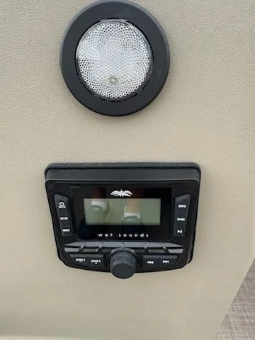 Slide: The Image of 2025 Sun Tracker Bass Buggy 16 XL Select audio system and speaker detail. - 8