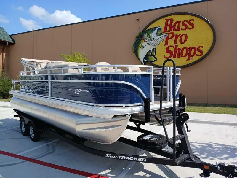 Slide: The Image of 2025 Sun Tracker Fishin' Barge 20 DLX pontoon boat at Bass Pro Shops. - 3
