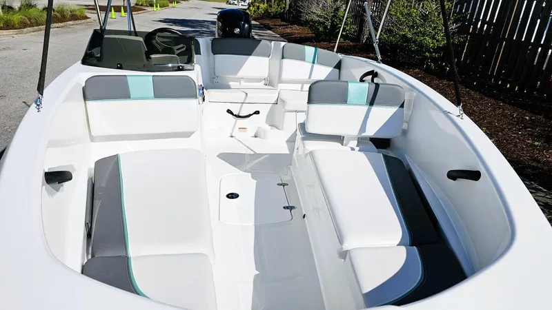 Slide: The Image of 2025 Tahoe T16 boat interior with spacious seating and modern design. - 10