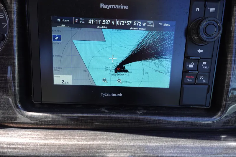 Slide: The Image of Raymarine navigation display on 2018 Monterey 295 Sport Yacht showing coordinates and route. - 11