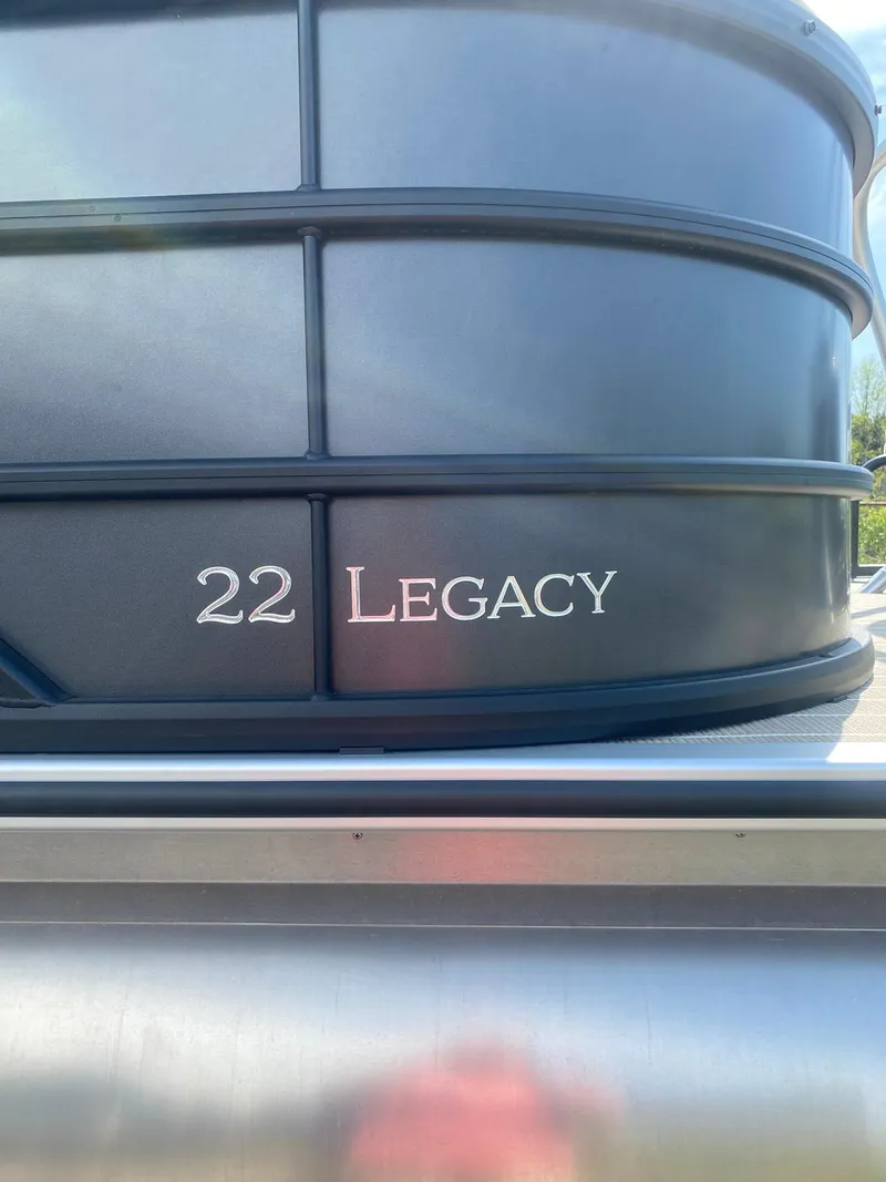 Slide: The Image of 2025 Bentley Pontoons Legacy 223 Navigator, close-up of "22 Legacy" branding. - 17
