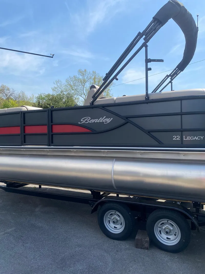 Slide: The Image of 2025 Bentley Pontoons Legacy 223 Navigator on trailer, side view. - 19