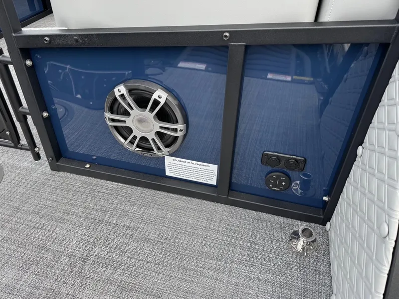 Slide: The Image of Speaker and controls on a 2025 JC SportToon 24 TT DSL boat interior. - 17