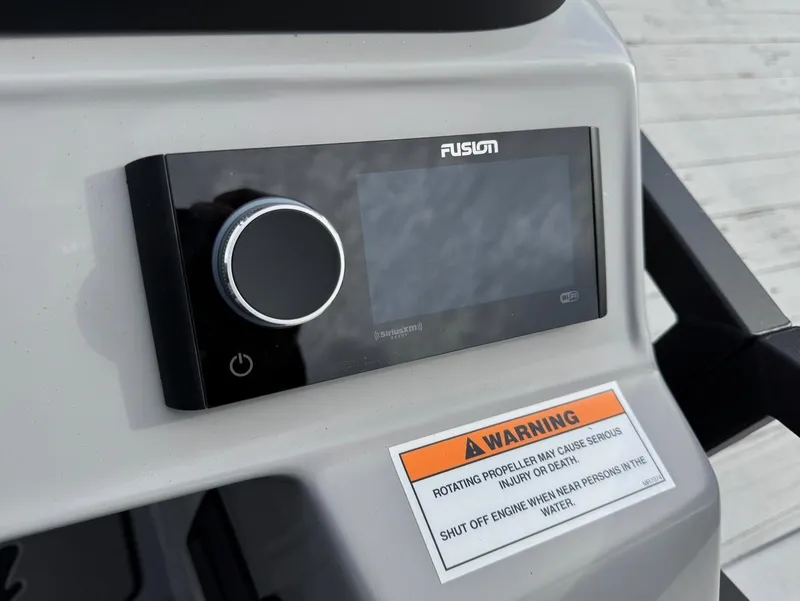 Slide: The Image of Control panel of 2025 JC SportToon 24 TT DSL with warning label. - 12