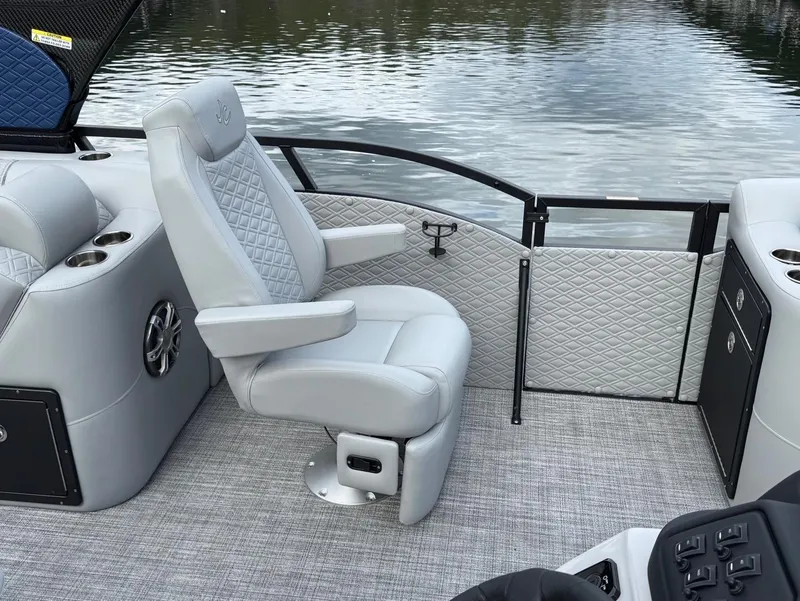 Slide: The Image of Luxurious seating on 2025 JC SportToon 24 TT DSL pontoon boat, featuring quilted upholstery. - 6