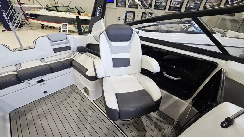 Slide: The Image of 2021 Yamaha Boats 212SD interior with sleek seating and modern design. - 10