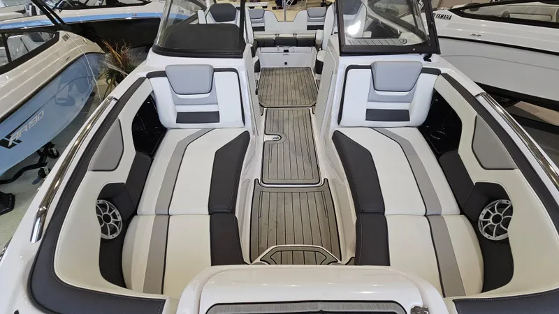 Slide: The Image of 2021 Yamaha Boats 212SD interior with sleek seating and modern design. - 19