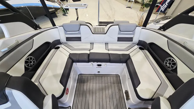 Slide: The Image of Interior of 2021 Yamaha Boats 212SD, featuring spacious seating and modern design. - 9