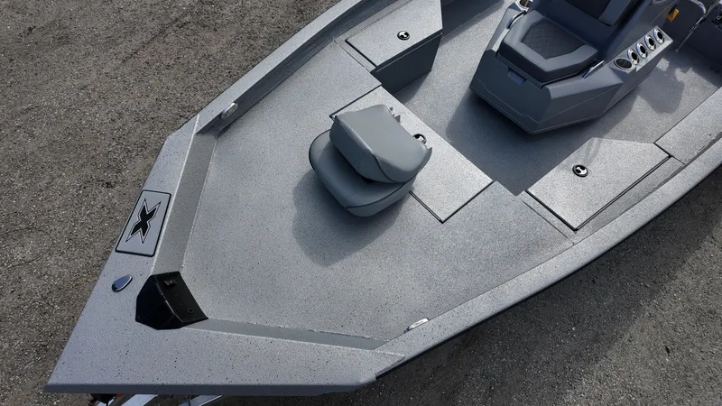Slide: The Image of 2025 Xpress H20B boat with sleek gray deck and seating. - 22