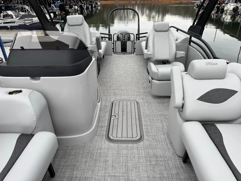 Slide: The Image of 2025 JC Neptoon Sport 23TT DSL pontoon boat interior with luxurious seating and modern design. - 12