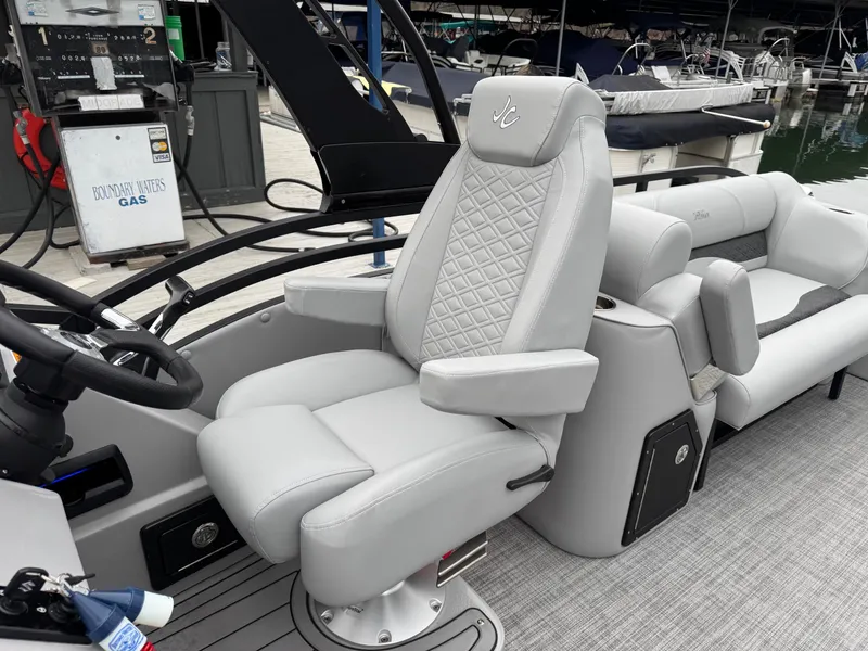 Slide: The Image of 2025 JC Neptoon Sport 23TT DSL boat interior with luxurious seating and modern design. - 18
