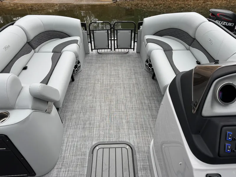 Slide: The Image of 2025 JC Neptoon Sport 23TT DSL pontoon boat interior with plush seating and modern design. - 8