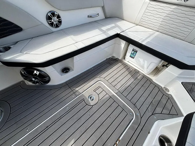 Slide: The Image of 2022 Sea Ray SPX 230 boat interior with sleek seating and modern design. - 10