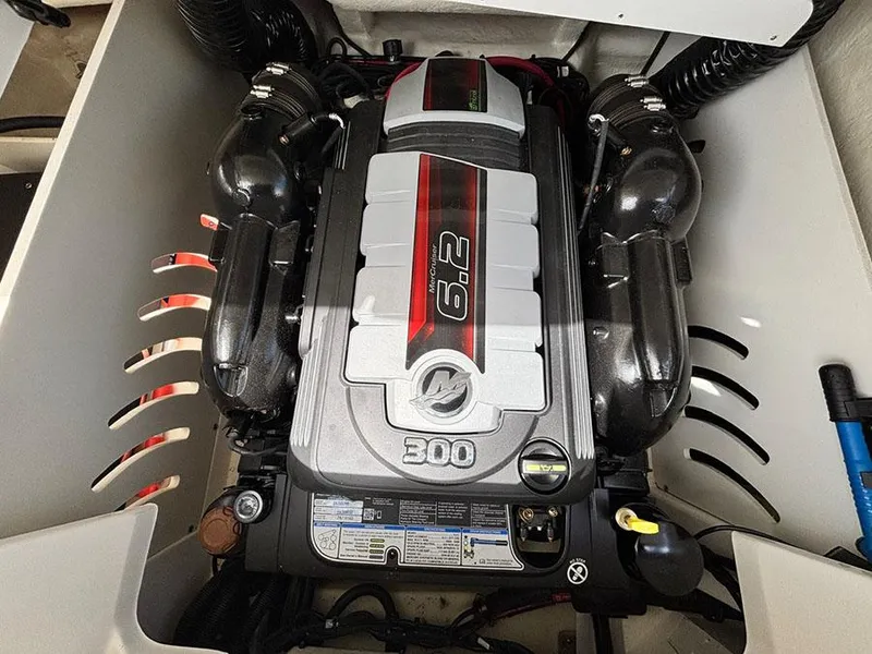 Slide: The Image of 2022 Sea Ray SPX 230 engine compartment with 6.2L 300 horsepower engine. - 8