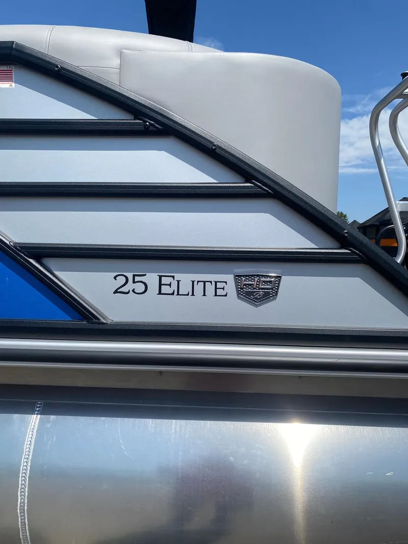 Slide: The Image of 2025 Bentley Pontoons Elite 253 Admiral, sleek design with modern detailing. - 13