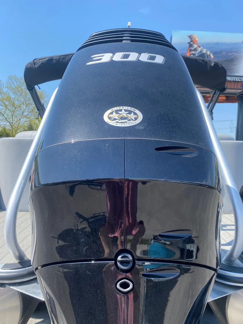 Slide: The Image of Close-up of a 2025 Bentley Pontoons Elite 253 Admiral engine, showcasing the 300 horsepower motor. - 20