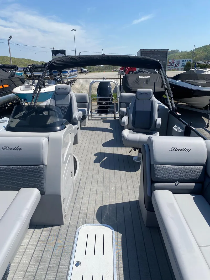 Slide: The Image of 2025 Bentley Pontoons Elite 253 Admiral with luxurious seating and sleek design on display. - 22