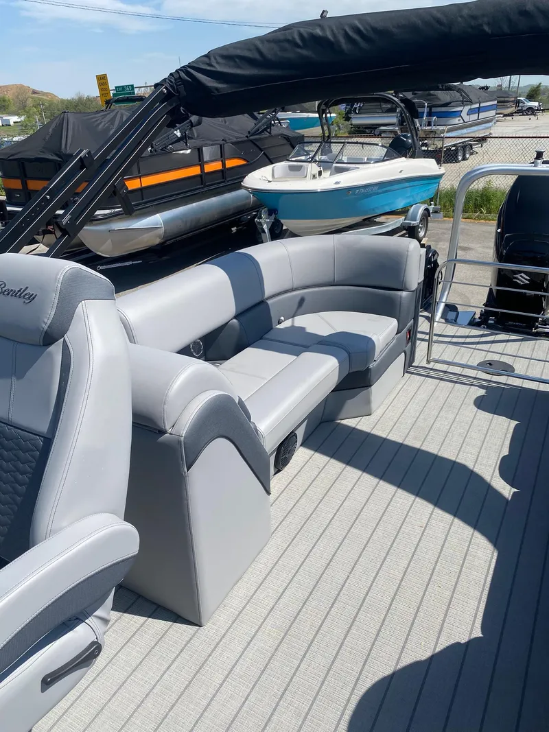 Slide: The Image of 2025 Bentley Pontoons Elite 253 Admiral with luxurious seating and sleek design. - 29