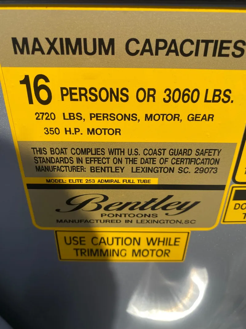 Slide: The Image of 2025 Bentley Pontoons Elite 253 Admiral capacity label, 16 persons or 3060 lbs, 350 HP motor. - 31