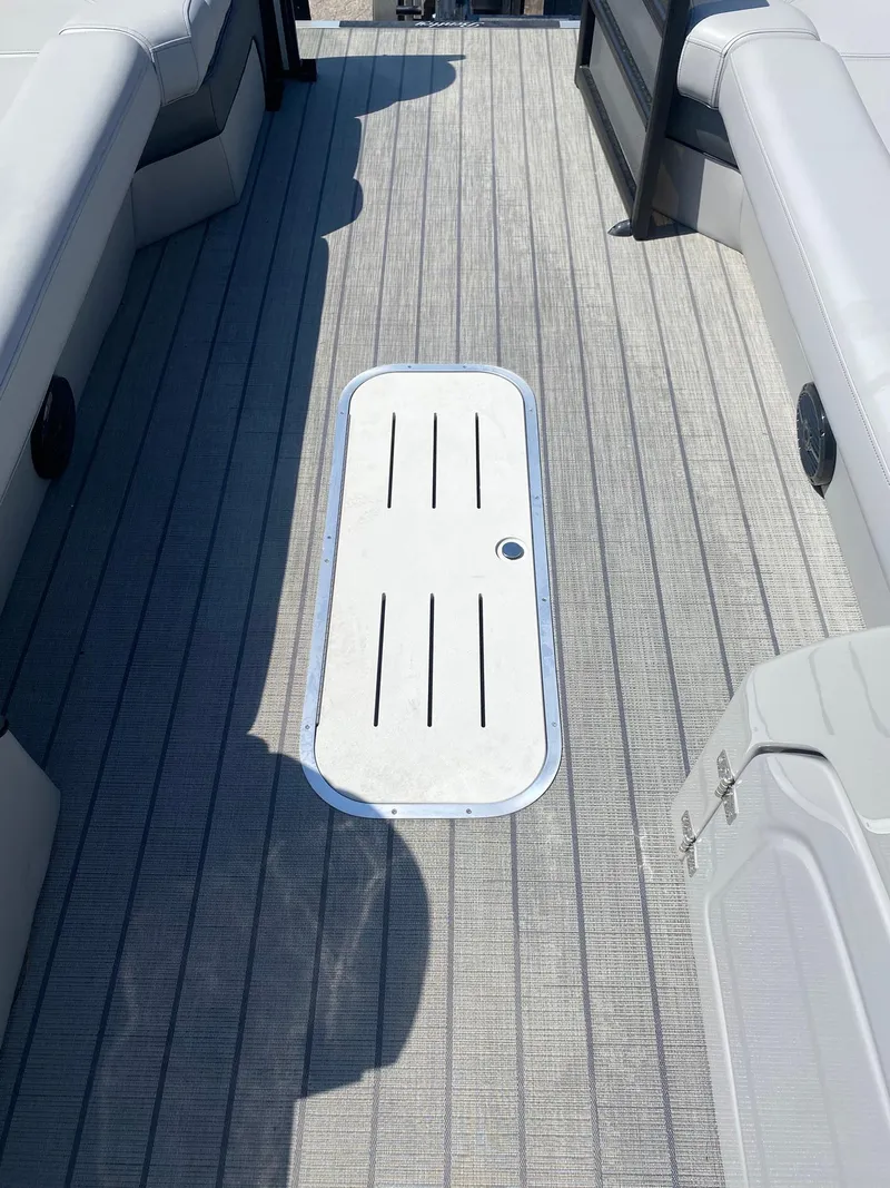 Slide: The Image of 2025 Bentley Pontoons Elite 253 Admiral deck with sleek seating and modern flooring. - 34