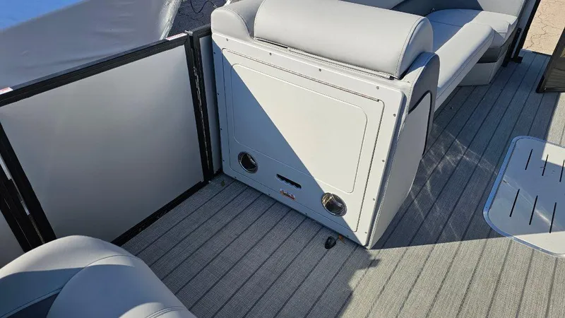 Slide: The Image of 2025 Bentley Pontoons Elite 253 Admiral interior with gray seating and flooring. - 6