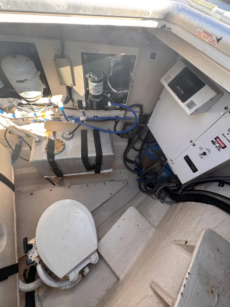 Slide: The Image of Engine room of 2018 Aquila 48 yacht with equipment and wiring. - 15