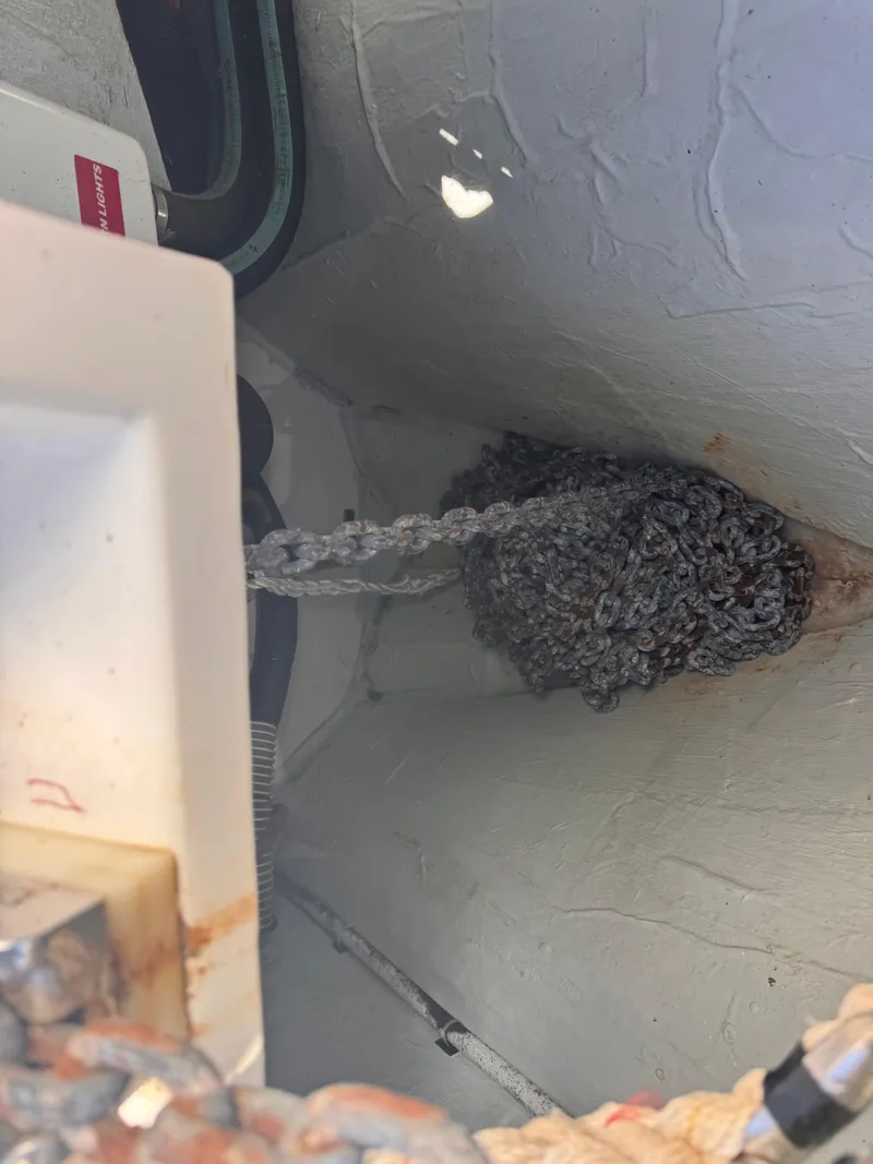 Slide: The Image of Anchor chain storage in 2018 Aquila 48 yacht compartment. - 19