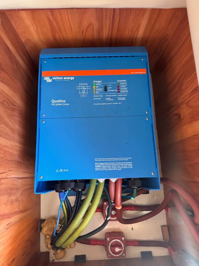 Slide: The Image of Blue Victron Energy Quattro inverter-charger in Aquila 48 yacht, 2018 model. - 26