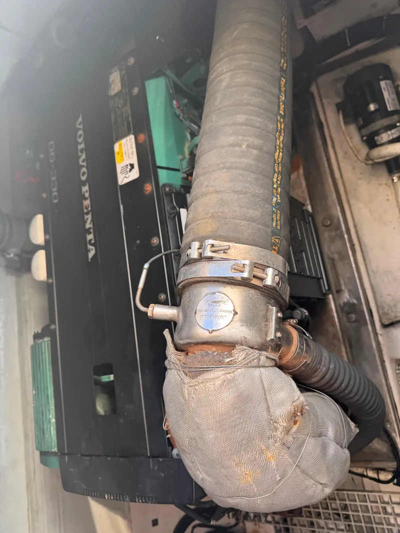 Slide: The Image of Engine compartment of a 2018 Aquila 48 with Volvo Penta components. - 30