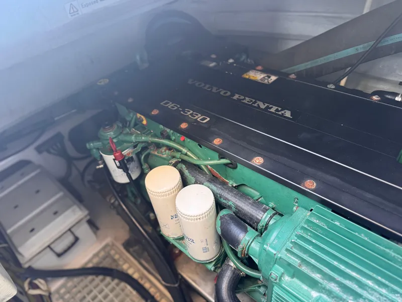 Slide: The Image of Engine compartment of a 2018 Aquila 48 featuring a Volvo Penta D6-330 engine. - 32