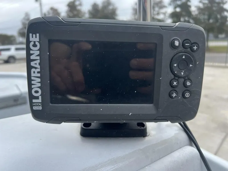 Slide: The Image of Lowrance Hook 5x HDI fish finder on 2014 Blue Wave 2200 boat. - 8