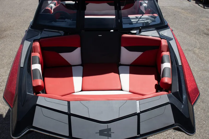 Slide: The Image of 2022 Axis A20 boat interior with red and white seating, viewed from above. - 5