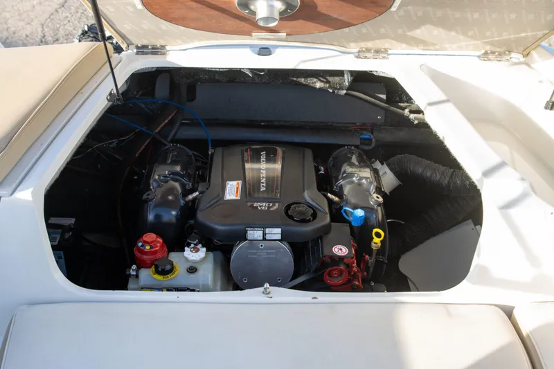 Slide: The Image of 2016 Stingray 215LR Sport Deck boat engine compartment with Volvo Penta V8 engine. - 9