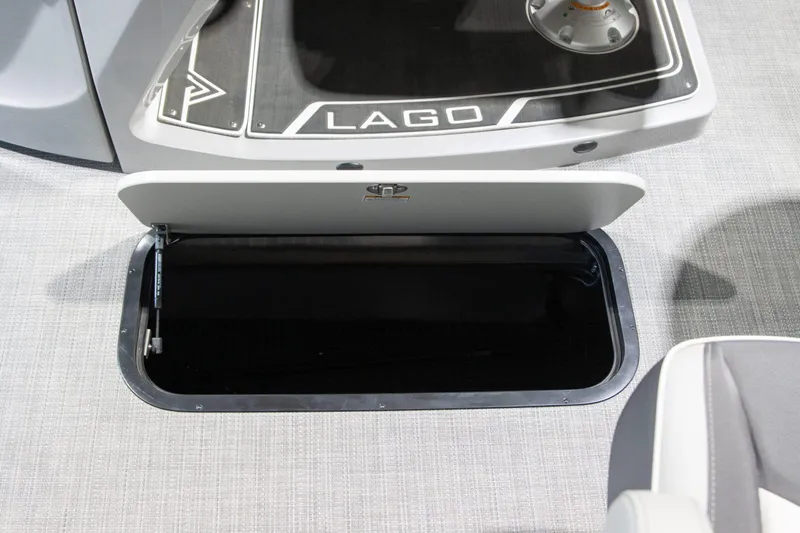 Slide: The Image of 2024 Viaggio Lago Z 22Q storage compartment with open hatch on boat deck. - 10