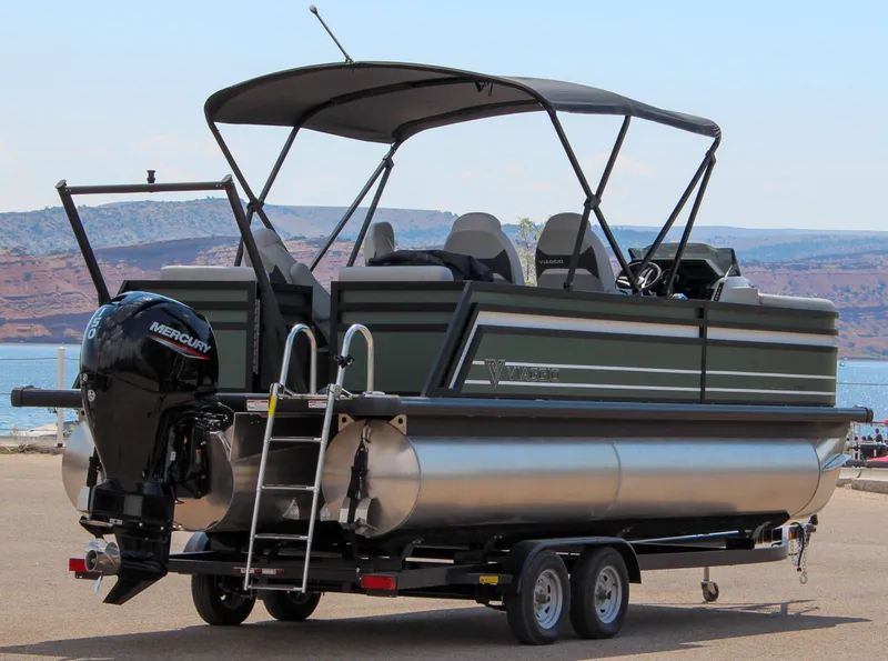 Slide: The Image of 2024 Viaggio Lago Z 22Q pontoon boat on trailer, featuring Mercury outboard motor. - 3