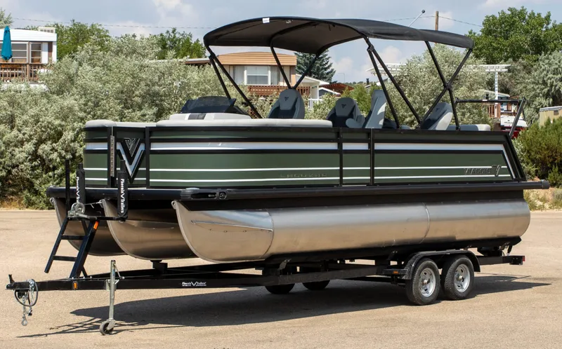 Slide: The Image of 2024 Viaggio Lago Z 22Q pontoon boat on trailer, parked outdoors. - 4
