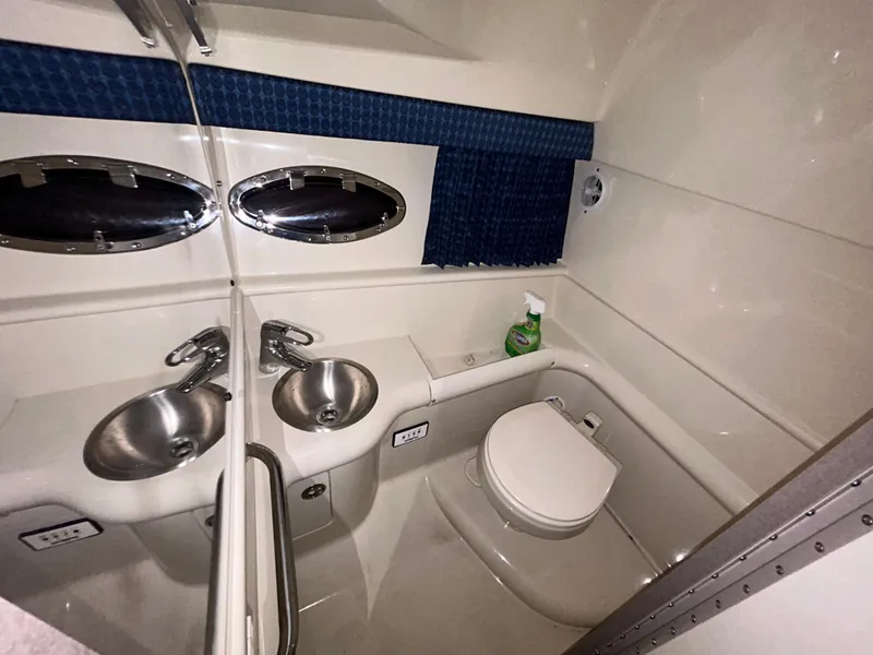 Slide: The Image of Bathroom interior of 2007 Formula 330 SS boat with sink and toilet. - 9